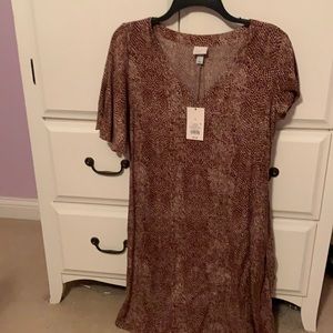 Snake Skin Dress that has a belt attached to it